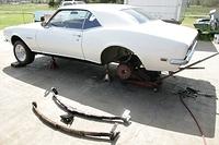 Here is the Camaro.  She is definately a survivor.  I can only hope to get her head up and looking proud.  In this case the rear end will have to go up first.  That way she can haul ass and not get damaged.