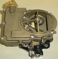Here you go. This is what the completed carburetor looks like.  Notice the correct Brass Fuel Fitting,  Pan Head Screws, Black Throttle Base, Bare Metal Appearing Linkage.  It has to look right to keep our status of a World Class Carburetor Restoration...