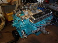 Here is the shot of the engine with the flash.  Kinda a nice deep blue.  It is definately all buttoned up.  Nice Heavy Duty Fuel Pump.  Just like the ones on the 389 and 421 Super Dutys.  Notice the hard line up to the carb.  I had to take off the fuel...