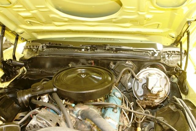 Now if you take a gander at the underside of the hood you will notice that the seal follows the flange under the hood.  That is why I use this much taller seal.  The cheap one's do not work.