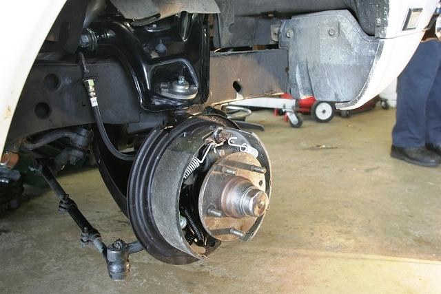 I will install the non finned brake drums onto the better than available front brake package.  If the car needs brakes down the road again then he can update them later as the budget permits.