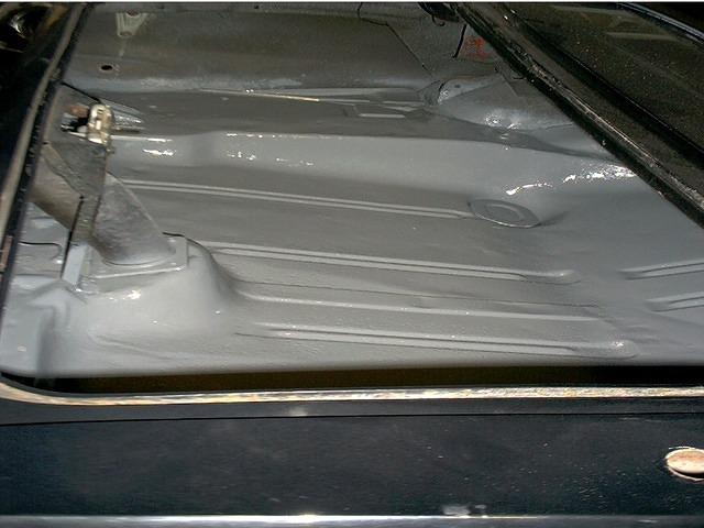 This is what a correctly metal etched trunk floor appears like.  I shot this picture just after laying down the metal etching primer.  It looks good.