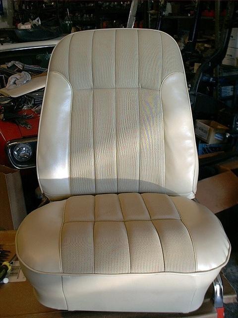 Here is a proud seat that I Upholstered myself.  You can see it is smiling and happy.  Nice curved lines, beautiful Parchment interior.  Kinda shines like a oyster shell