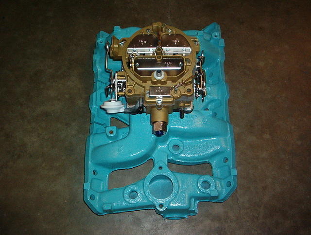 Here you see the start of the Intake and Carb Restoratioin.  Look at that nice correctly painted intake.  Notice the correct Date Code and Color.