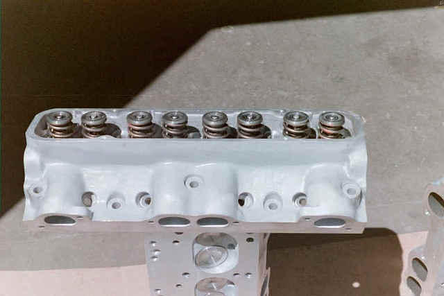 Here are the custom heads we had to machine up for the vehicle.  In order to make this type of power it was going to take huge cavernous  intake ports and pent exhause ports.