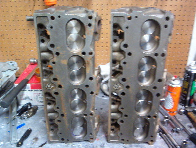 Here is an example of a correct set of heads done correctly.  I could see daylight thru one set of valve seats on the old ones that came off.  I wonder if they really care at machine shops.