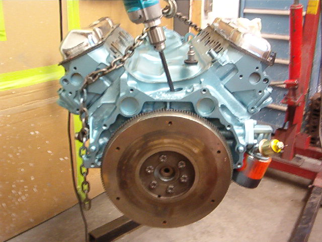 Here is the Flywheel getting ready to be installed and torqued up to the crankshaft.  It only goes on one way.