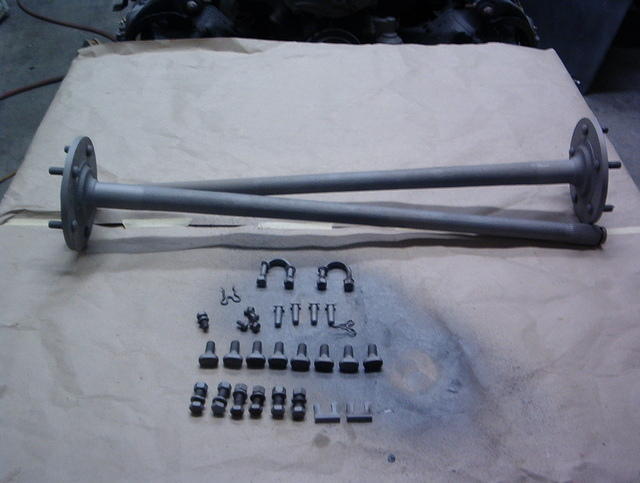 Here are the replacement axles and the bolts, straps, ubolts, tbolts and etc needed to install the rear brakes and etc.