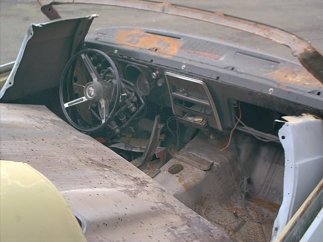 Just look at the fenders and the hood thrown into the car.  With no regard for the dents that were caused or the parts that were ruined.  Look at the state of the art dash repair.