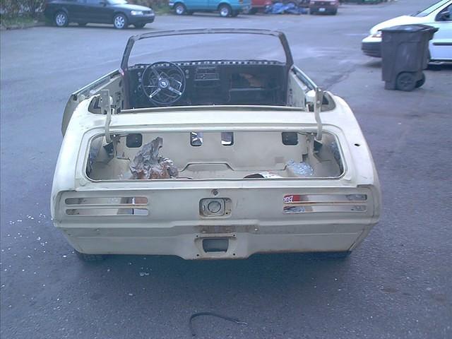 Here is a shot of the back of the car with the Deluxe Steering Wheel.  You can begin to understand the incredible damage that these people have done when you look at one fully restored.