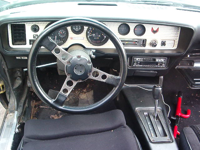 Oh I got one of you new also.  I am sorry to mention this but the old steering wheel is history.  Seems I found a new Steering Wheel and Center Cap.  Boy what an interior Restoration Statement that will be.