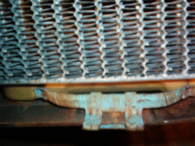 These two tangs are made of Spring Steel and they exert pressure on the Heater Core to keep it solid against the Heater Core Seal inside the Heater Core Box.