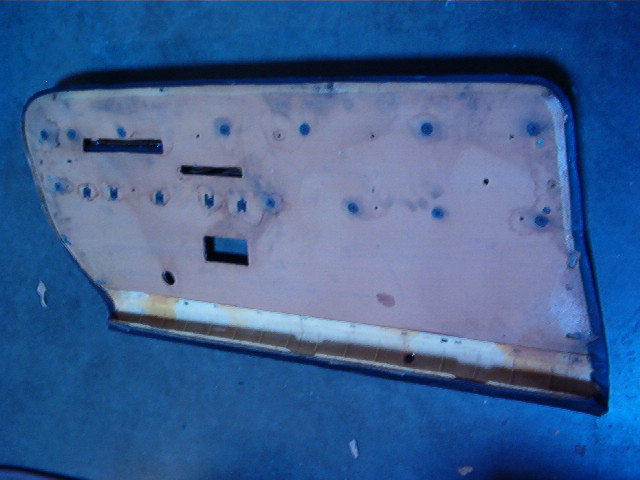 It was one of the first cars that I have taken the door panels off of and see the black tar paper still in place and performing a perfect job of protection of the inner door panel.