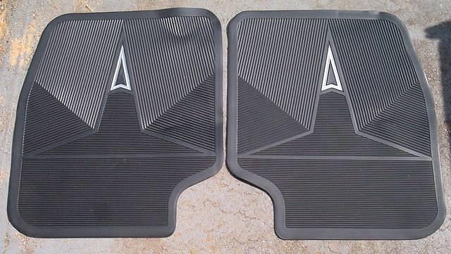 Not to mention these perfect condition GTO floor mats. Now these are a rare find.  You would have to trim them to fit correctly from the factory.  I am sure that they are correct.