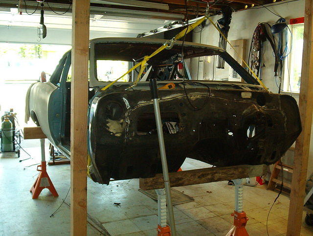 Perhaps he is hoping that the rust will run down to the quarter panels and be easier to fix.  In this case that could be right.  Lets hope that the upper metal looks good.
