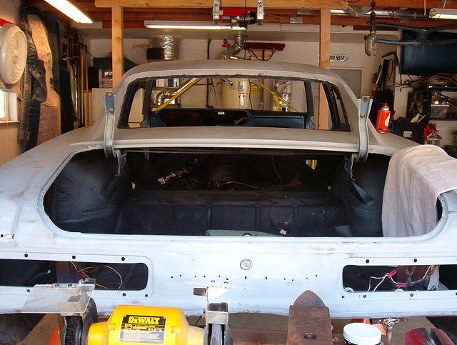 In this case the Tail Panel and the Rear Window area are just mint.  He was very fortunate there.  In most cases these areas are just rotted to hell.  It requires a lot of welding and panel replacement.