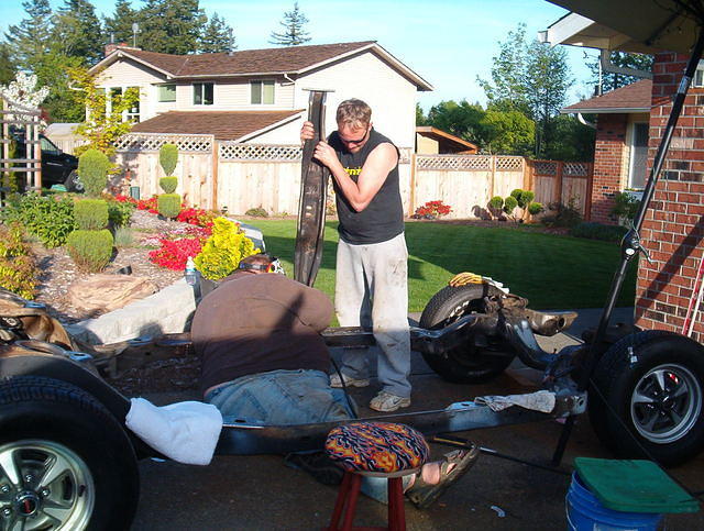 Here is Jim.  He is a good mechanic all by himself.  His car is now all apart.  They followed my instructions and removed all the parts, placed them into bags and boxes.  Correctly indentified them and etc.