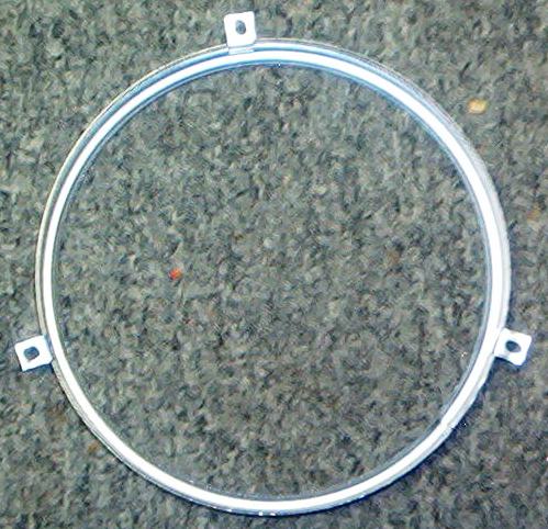 Here is another picture of the Headlight Retention Ring.  Imagine the costs that you would have if you were to attempt to replate this item and straighten it up.  Not only would you be spending excessive labor but the quality would not show up on your ...