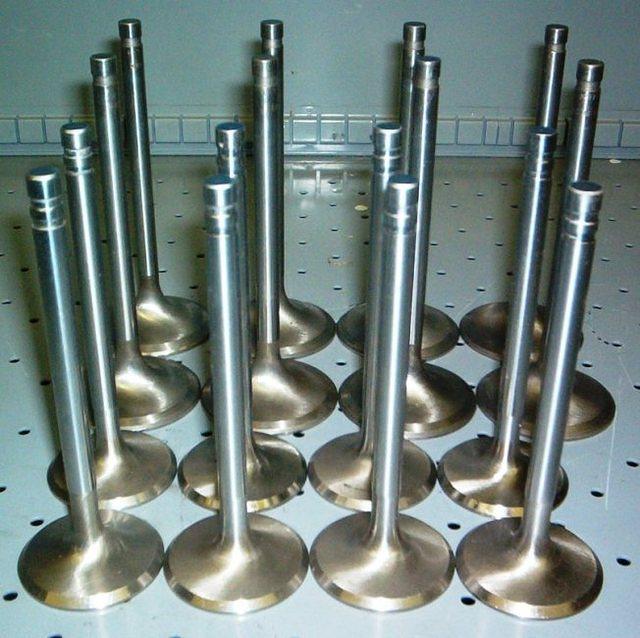 Valves in the Heads?  Stock?  Nah, they are just worn to hell usually.  Inconell? Titanium?  You bet if you got cubic inch money.  If not then you need our Stainless Steel Swirl Polished Valves, just like the factory installed on RAM AIR FOUR heads.  Q...