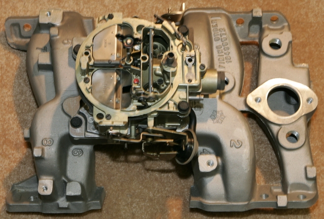 Here is what your actual Carburetor will look like on your Intake Manifold.  I am in the process of getting this whole package up and together.  Hard to make sure that all the actual items are correct.