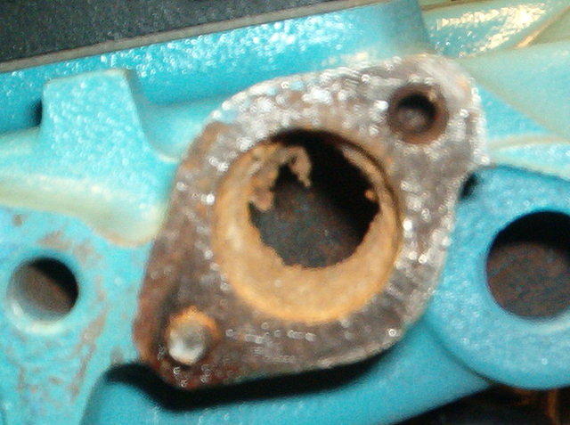 Once the broken flange has been removed just take a big drill bit and drill out that plug, unless you can extract it with a self tapping screw.