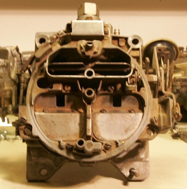 Well here is the GTO carburetor that I have to transform into a Trans Am Carburetor.  No problem.  I have the technology.  On top of that I also care what my customers think and shall do it with impecible perfection.  I shall strive to exceed every sta...