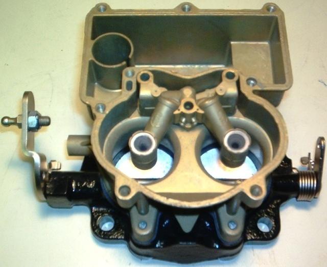 Notice that the inside of the carburetor is also plated.  That is so that the fuel will not have to put up with an ugly carburetor and not burn right.  Or perhaps it is just what is required to make the carburetor function correctly.