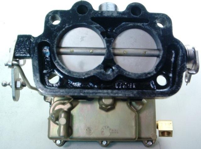 This is a shot of the Rear Carburetor.  You can tell that it is the back one by the lever.  Notice that all the fittings, and Linkage connectivity are correct and OEM.  This is not easy to do.