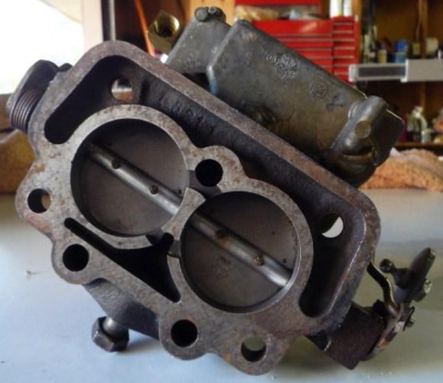 Of course there are many other identifiers that will indicate the vinatage of this carb.  Notice the Specialized Bolt that plugs the rear of the Base Plate.  This is a NO-NO.  Do not use bolts in Pipe Threaded Holes.  The bolt threads are parallel.  Th...