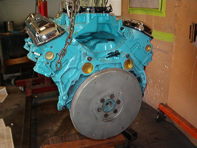 Now with the holes all filled and properly sealed it is time to install the Flywheel.  Notice that it will only bolt up one way.  Please do not try any other.  Crankshaft damage will happen.  If the bolts are not going in by hand you screwed up.