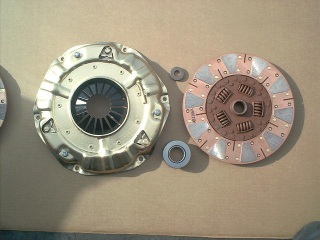 Here is the Heavy Duty Clutch plate and Velvetouch Clutch disk.  This ought to outlast the life of the car.  Unless he gets booted out by the old lady and has to drive his car to work.