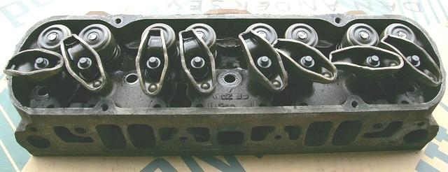 Well right in between the two middle Rocker Arms will you find the Date Code.  That is the exact date that the Sand Casting of the 093 Cylinder Head was produced.