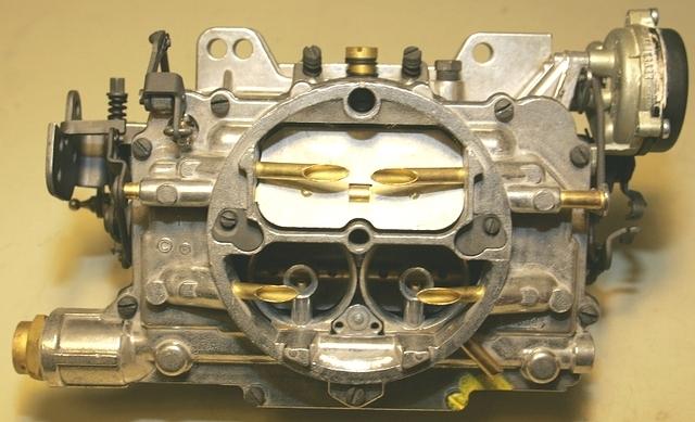 Well now it is off to paint the Manifold.  I will carefully chase the threads on the manifold and get to painting.  Then it will be new studs, nuts, carburetor, gasket, and etc.  I cannot wait to shoot the picture.  It is coming together.  Keep the fai...