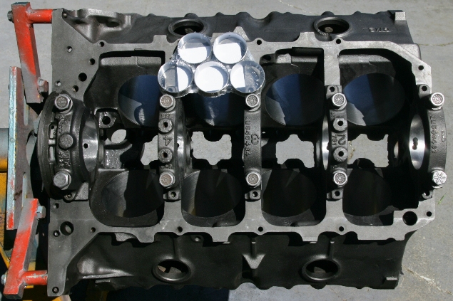 There are five bearings that go into the block.  They go in only one way.  There is also the main metering hole in the camshaft that has to be aligned with the oil galley hole.