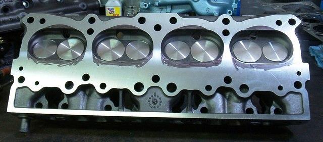 If you are going to try this at home I wish you the best of luck.  I let Jim grind till his hands hurt and he had enough.  I then finished the job.  It still took 80 hours more on the heads alone.  The intake manifold took 4 hours just to blend the fla...