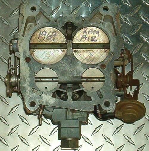 This is the rare and hard to find Ram Air Carburetor.  We found this on the internet.  It was all that the seller claimed it to be. What luck