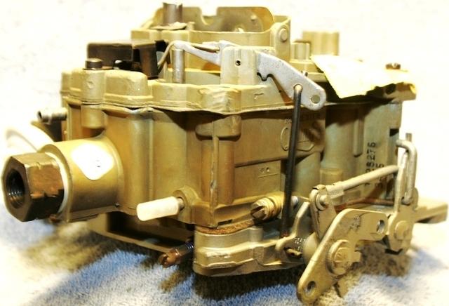 Not only that but it looks just like it came off a tank in world war II.  Yes the plating on the old carbs tends to look quite dull and lackluster.  You will notice that the gasket between the main body and the air horn has corossion on it.