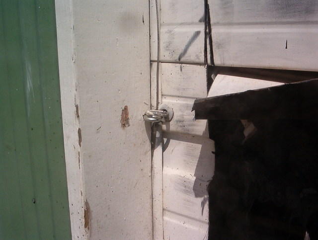 Missing Lock, Funny Holes in Garage Doors