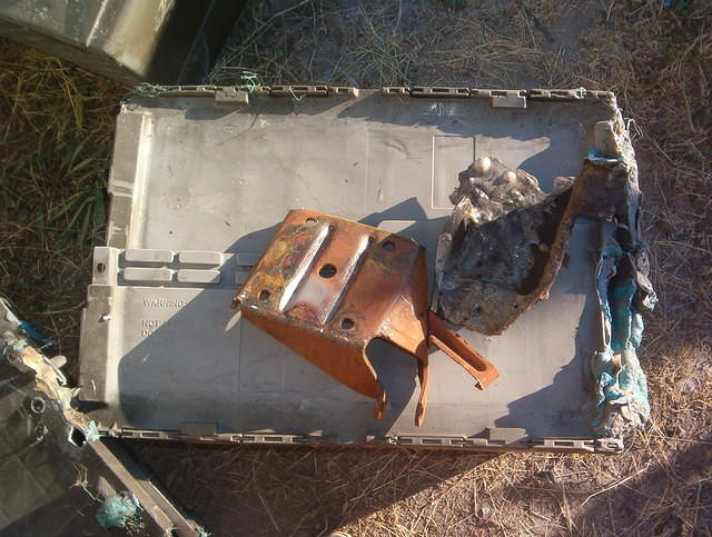 This container was just burnt on the leading edge.  I found several containers like this.  They were the ones full of metal.  They were in the bottom shelves.