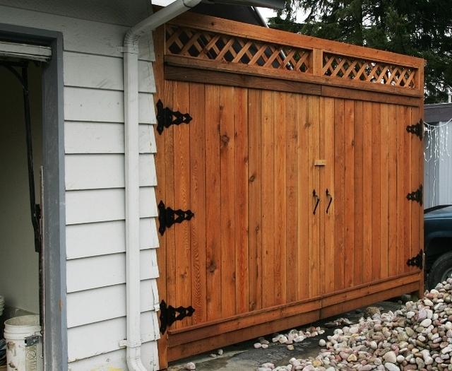 The vehicle gate was made just like the man gate.  Very heavy duty construction.  One set of extra hinges to keep the gates in spec.  They were designed to remain square for years to come.  The lattice was custom made to the gate.