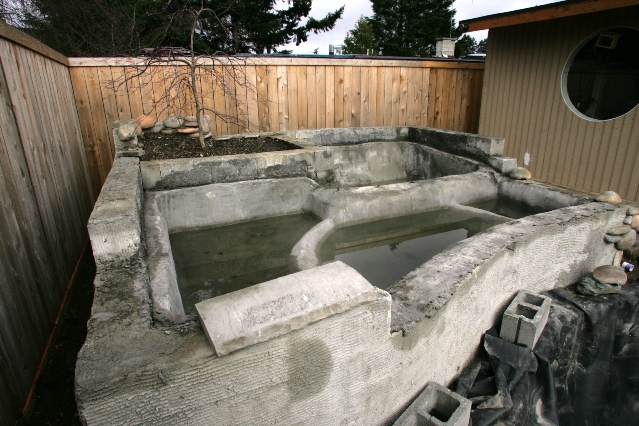 We able to make the three ponds in the upper setup.  It took just a bit of time to design how they would flow into each other and over the edge into the lower pond.  It was to be a work of art.