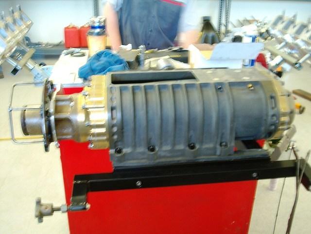 Here was their blower.  Quite a big rock.  I was somewhat amazed at the design of it also.  I was really expecting to find near friction free rotation, coated gears, compressor lobes, special sealing strips and extremely accurate tolerance.  What I fou...