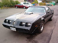 Well here is Ron's car.  I was up visiting the Canadians with the Big Rascals a few winters ago.  I left a card because I saw a beautiful Survivor under the Marks Of Battle.