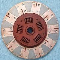 The ten pucks that are bonded to the copper rings are made of metal and composite material.  They will last far longer than any other type of clutch material.  They will also make your car go sideways on command.