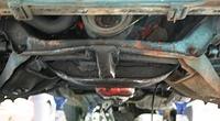 Ugly oil pan. See how low they hang.  Not to mention that it does not fit right with the wrong mounts on the frame.  Shame of the matter is the Camaro Mounts would of worked fine.