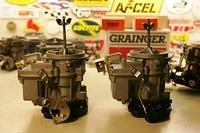 So I went ahead and made a set out of later model Rochester Carburetors.  In all actuality it takes me a bit more time and labor to perform this task.  I really do not like it but in Terry's case the difference would be about $1000.00 less in the bill.