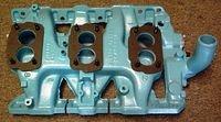 The carburetor baseplate gaskets are the thickest I can have manufactured.  This way the carbs are isolated as much as is possible from the hot intake.  This eliminates Fuel Soak.