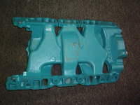 These pictures are of the correct 64 Tri Power Intake Manifold that you will need.  If you want I can also sell you the correct 64 Intake Manifold with the Tri Power.