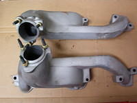 What are these big huge manifolds.  They are Pontiac Ram Air Three Factory Exhaust Manifolds.  Now if you are a "Strip Racer" then you need to go out and buy Heddars.  These would not be for you.