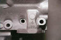 On this GTO Cylinder Head the Casting Code is on the outer Exhaust Port.  The number above the Casting Code is not indicative of the head.  The number that is important is the "77"